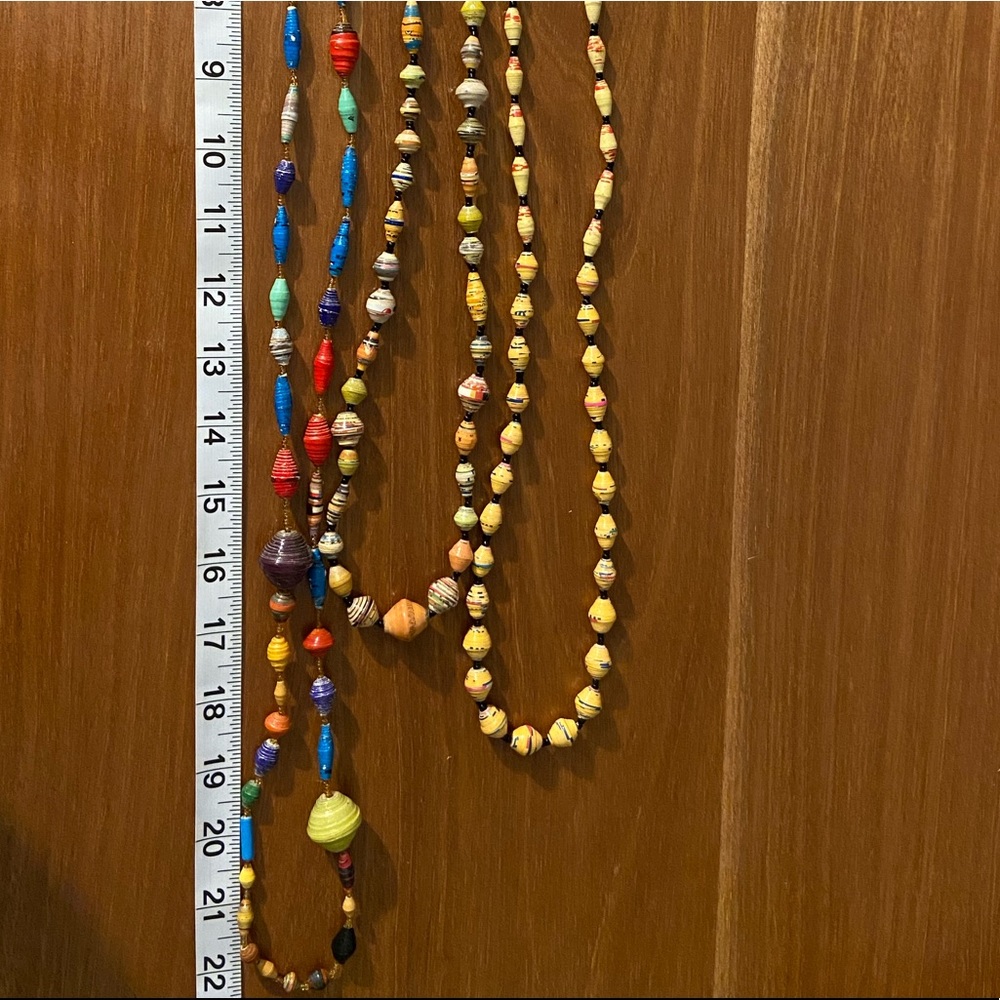 3 Beautiful Beaded Necklaces. Made of recycled newspaper + wax. Beads for life